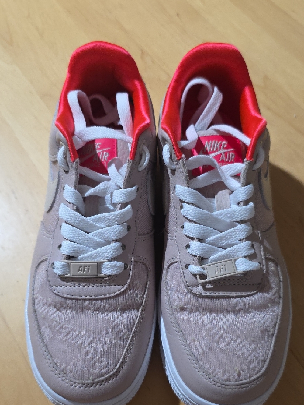 Nike Air Force 1 Low in Light Pink with Coral Lining